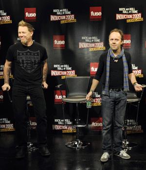 Vocalist James Hetfield and drummer Lars Ulrich of Metallica, the heavy metal band, react as they decide where to sit as the Rock and Roll Hall of Fame announced their 2009 inductees in New York, January 14, 2009. 