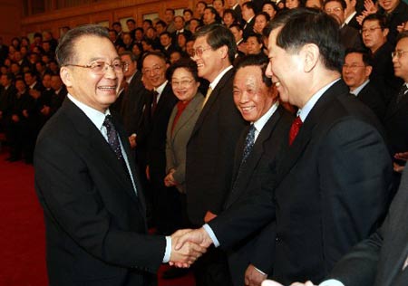 Chinese Premier Wen Jiabao meets representatives attending a Party conference of the central and state agencies in Beijing on Jan. 15, 2009.