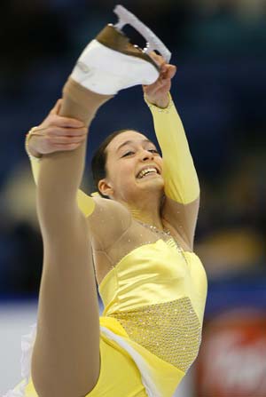 Alexandra Najarro of Ontario holds her skate above her head while competing in the junior women free program at the Canadian Figure Skating Championships in Saskatoon, Saskatchewan, January 15, 2009.