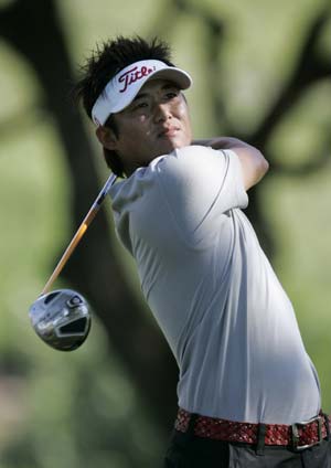 Ryuji Imada of Japan follows his drive off the sixth tee at the Sony Open golf tournament in Honolulu, Hawaii January 15, 2009.
