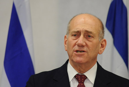 Israeli Prime Minister Ehud Olmert speaks at a press conference after security cabinet meeting in Tel Aviv, on Jan. 17, 2008. Israeli Prime Minister Ehud Olmert Saturday evening declared a unilateral ceasefire in the Hamas-ruled Gaza Strip, beginning from 2 a.m. (0000 GMT) Sunday. The declaration came shortly after Israeli security cabinet voted in favor of a unilateral ceasefire in Gaza, where Israel Defense Forces (IDF) Cast Lead Operation had been going on in the past three weeks, killing more than 1,200 Palestinians. 