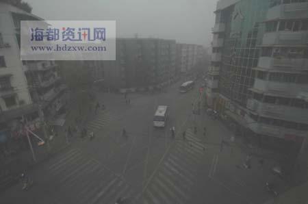 Downtown Chengdu was still covered by fog at 1 p.m..