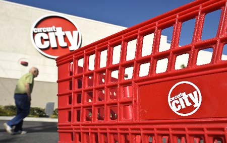 A shopper heads into a Circuit City store in Roseville, California, Jan. 17, 2009. Bankrupt Circuit City Stores Inc., unable to work out a sale of the company, said Friday it will go out of business — closing its 567 U.S. stores and cutting 30,000 jobs. 