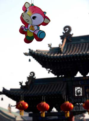 An ox-shaped colored lantern to mark the upcoming year of the Ox is seen in Pingyao, north China's Shanxi Province, Jan. 17, 2009. The time-honoured Pingyao city listed among the UNESCO World Cultural Heritages prepares for the approaching Spring Festival with traditional celebrations. 