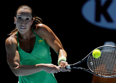 Jelena Jankovic of Serbia hits a return against Yvonne Meusburger of Austria during their women's singles first round match on the first day of the 2009 Australian Open in Melbourne on Jan. 19, 2009. Jankovic won 6-1, 6-3. [Xinhua]