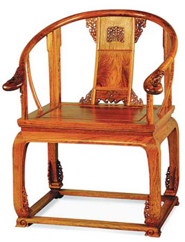 A replica Ming-style chair made of yellow rose wood is among the collections of rare wood furniture in Chan's museum. 