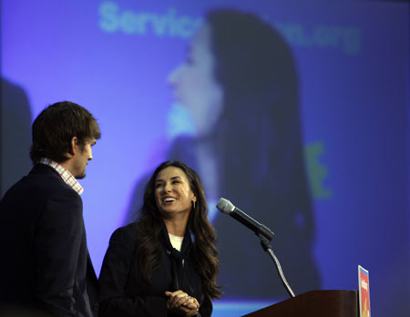 Actors Ashton Kutcher (L) and Demi Moore introduce their Presidential Pledge video at ServiceNation's New Era of Service breakfast, part of the Martin Luther King Jr. Day of Service, in Washington January 19, 2009 leading up to the inauguration of U.S. President-elect Barack Obama. 