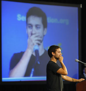 Actor Tobey Maguire reacts after listening to U.S. Congressman John Lewis (D-GA) at ServiceNation's New Era of Service breakfast, part of the Martin Luther King Jr. Day of Service, in Washington January 19, 2009 leading up to the inauguration of U.S. President-elect Barack Obama. 