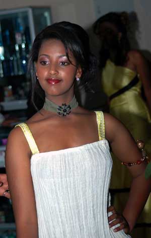  A girl poses for a photo at the tiring-room during the finals of the Miss Ethiopia 2009 Beauty Pageant in Addis Ababa, capital of Ethiopia, Jan. 18, 2009. 