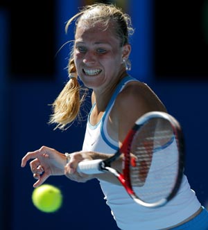 Angelique Kerber of Germany returns the ball during the first round match of women's singles against Venus Williams of the United States at the Australian Open tennis tournament in Melbourne, Jan. 20, 2009. Angelique Kerber lost 3-6, 3-6.[Xinhua]