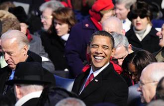 Barack Obama smiles before he takes oath as the 44th president of the United States of America in front of the U.S. Capitol in Washington D.C. Jan. 20, 2009. [Zhang Yan/Xinhua]
