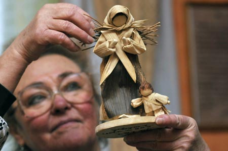 Ulicsni Arpadne displays a handicraft made by herself in Kunhegyes of Hungary on Jan. 19, 2009. Ulicsni Arpadne, a retired teacher of a kindergarten in Kunhegyes made varies handicrafts by the husk of a kind of corn that was planted by herself.