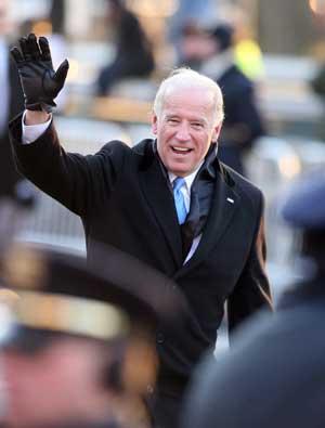 Newly-inaugurated US Vice President Joe Biden waves to the crowd during the inaugural parade in Washington D.C. Jan. 20, 2009.