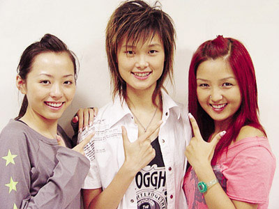 The 2005 'Super Girl' finalists, from left to right, Zhang Liangying, Li Yuchun and He Jie. 