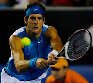 Juan Martin Del Potro of Argentina returns the ball to Florian Mayer of Germany during the men's singles second round match at the Australian Open tennis tournament in Melbourne, Australia, Jan. 21, 2009. Del Potro won 3-0.