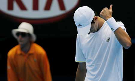 Novak Djokovic of Serbia gestures during the second round match of men's singles against Jeremy Chardy of France at the Australian Open tennis tournament in Melbourne, Jan. 21, 2009. Djokovic won 3-0 (7-5, 6-1, 6-3). 