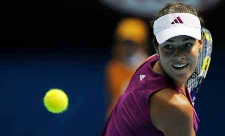 Ana Ivanovic of Serbia returns the ball during the second round match of women's singles against Alberta Brianti of Italy at the Australian Open tennis tournament in Melbourne, Jan. 21, 2009. Ivanovic won 2-0. 