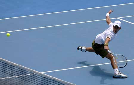 Novak Djokovic of Serbia returns the ball during the second round match of men's singles against Jeremy Chardy of France at the Australian Open tennis tournament in Melbourne, Jan. 21, 2009. Djokovic won 3-0 (7-5, 6-1, 6-3). 