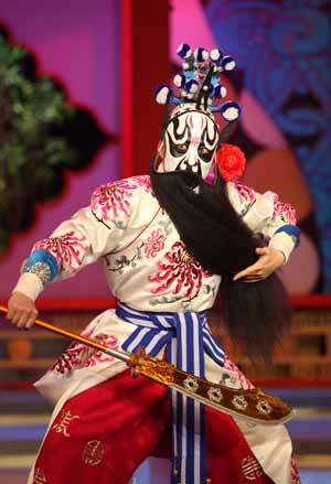 Xi Zhonglu, a Peking opera performer, performs during a dress rehearsal in China's biggest TV station, CCTV, in Beijing, capital of China, Jan. 10, 2009. 