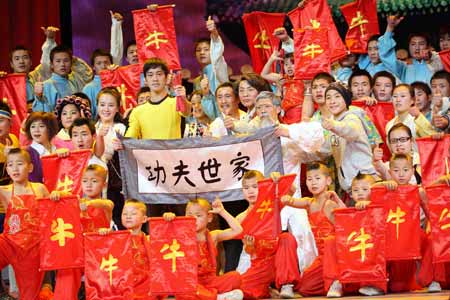 Performers pose after wushu performance during a dress rehearsal in China's biggest TV station, CCTV, in Beijing, capital of China, Jan. 13, 2009. China's annual televised Spring Festival (Lunar New Year) Gala, a traditional centerpiece of celebrations to mark the country's most important festival, will be on in the evening of Jan. 25, 2009.