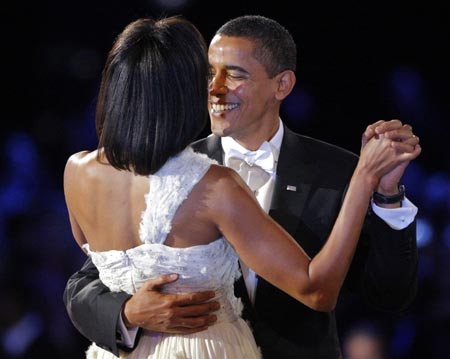 U.S. President Barack Obama and first lady Michelle Obama dance their first dance at the Neighborhood Inaugural Ball in Washington January 20, 2009.