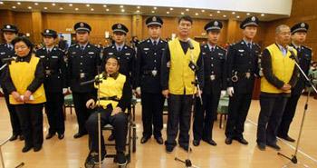 The four indictees Tian Wenhua, Wang Yuliang, Hang Zhiqi, Wu Jusheng (L to R) stand on trial on the court, in Shijiazhuang, north China's Hebei Province, Dec. 31, 2008.[Ding Lixin/Xinhua] 