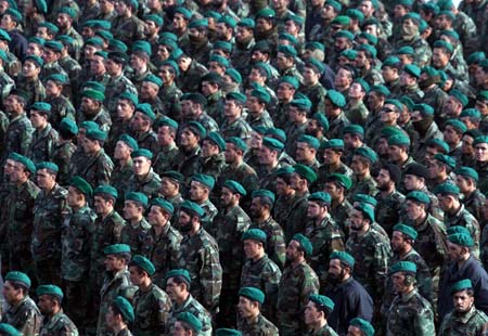 Afghan National Army soldiers march during a graduation ceremony in Kabul, capital of Afghanistan, Jan. 22, 2009. More than 1,500 Afghan National Army officers and soldiers graduated from the six-month training at Kabul Military Training Center (KMTC) on Thursday. Afghanistan has reached its primary goal of 80,000 troops, which is aimed to achieve 134,000 till 2011. 