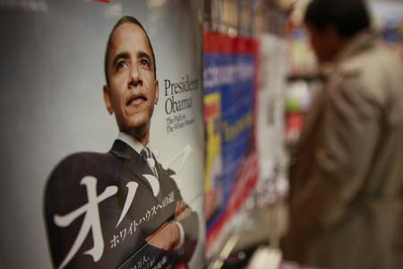 Books about U.S. President Barack Obama are displayed at a bookstore in Kanta in Tokyo, capital of Japan, Jan. 22, 2009.