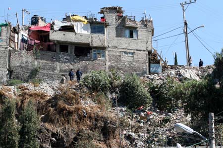 Photo taken on Jan. 22, 2009 shows a scene of a landslide in Mexico City, capital of Mexico, Jan. 22, 2009. 