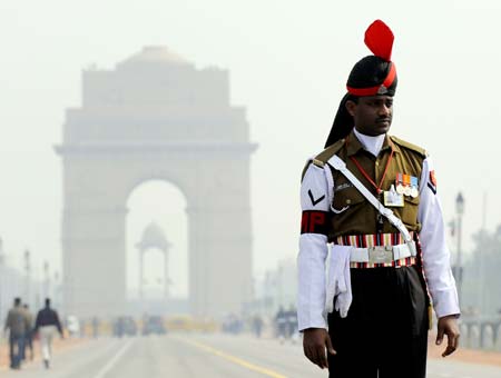 An Indian soldier guards the full dress rehearsal of the Republic Day parade in New Delhi, capital of India, on Jan. 23, 2009. India will celebrate its Republic Day on Monday. (Xinhua/Wang Ye)