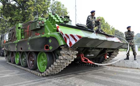 A tank of Indian Army waits to attend the full dress rehearsal of the Republic Day parade in New Delhi, capital of India, on Jan. 23, 2009. India will celebrate its Republic Day on Monday. (Xinhua/Wang Ye)