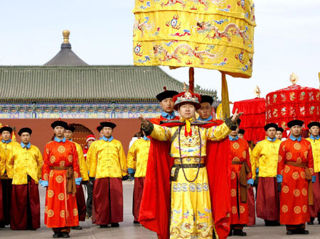 An actor who is dressed as a Qing Dynasty emperor gestures during a performance in Beijing January 23, 2009. 