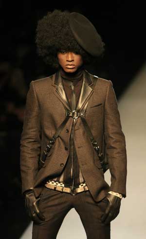 A model displays creations by Jean-Paul Gaultier of his Fall/Winter 2009/2010 men's collections during Paris Fashion Week, on Jan. 22, 2009. 