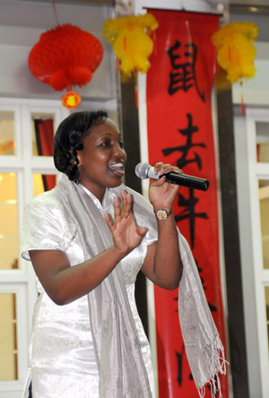 A student of the Confucious Institute of Nairobi University sings a Chinese song at the Chinese Embassy in Kenya in Nairobi, capital of Kenya, on Jan. 23, 2009.