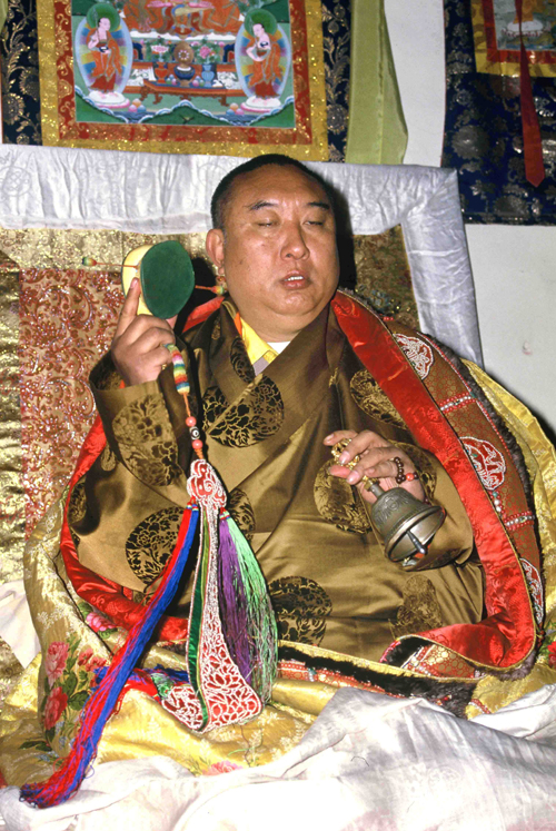 The 10th Panchen Lama chanting a prayer during his birthday celebration at the Xihuang Temple. 
