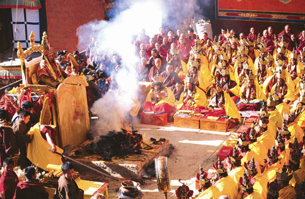 Monks in the Tashilhunpo Monastery holding a fire ritual for the opening ceremony of the monument to the Fifth, Sixth, Seventh, Eighth and Ninth Panchens.