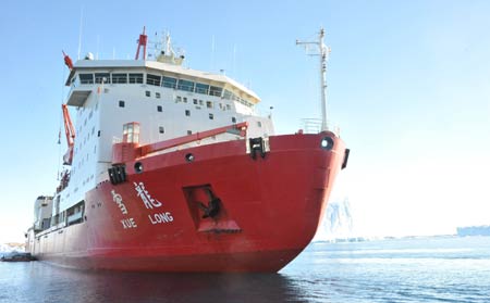 China&apos;s Antarctic ice breaker Xuelong, or Snow Dragon berthes near China&apos;s Zhongshan Antarctic Station, on Jan. 29, 2009. As glaciers clears off, Xuelong began unload goods to Zhongshan Antarctic Station.