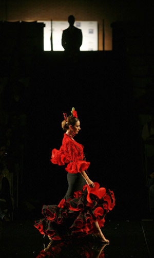 A model presents a creation from Hermanas Serrano during the International Flamenco Fashion Show in Seville January 30, 2009.