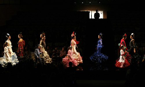 Models present creations from Hermanas Serrano during the International Flamenco Fashion Show in Seville January 30, 2009.