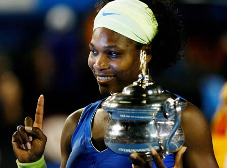 Serena Williams of the United States poses with the trophy after her victory over Dinara Safina of Russia in the women's singles final at Australian Open tennis tournament in Melbourne, Jan. 31, 2009. Williams won 2-0. 