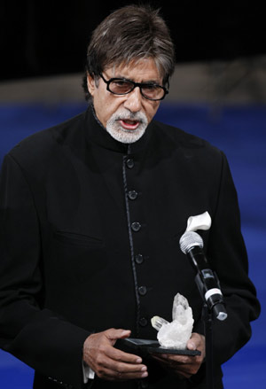 Bollywood actor Amitabh Bachchan gives a speech after being honoured during the Forum's Crystal Award ceremony at the World Economic Forum (WEF) in Davos January 31, 2009.