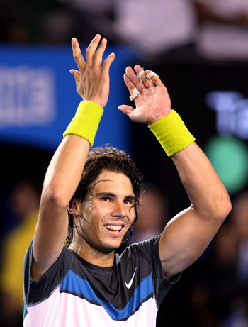 World number one Rafael Nadal won his first Australian Open title after outplaying world number two Roger Federer in the men's final on Sunday.