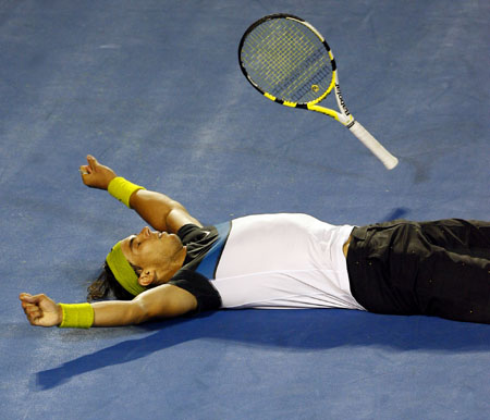 Rafael Nadal of Spain jubilates after the men's singles final against Roger Federer of Switzerland at Australian Open tennis tournament in Melbourne, Feb. 1, 2009. Nadal won the match 3-2. 
