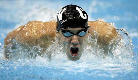 Michael Phelps swims during his heat in the men's 200m butterfly at the U.S. Olympic Swimming Trials in Omaha, Nebraska in this July 1, 2008.