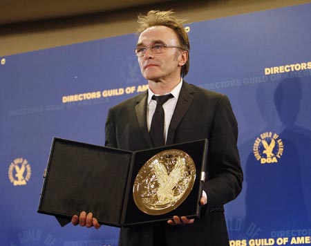 Director Danny Boyle poses with his award for outstanding directorial achievement for the feature film 'Slumdog Millionaire' at the 61st annual Directors Guild of America Awards in Los Angeles January 31, 2009. 