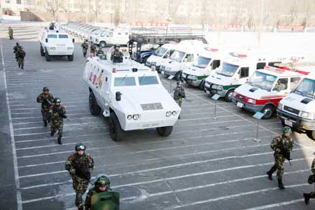 Members of armed police take part in an anti-terrorism drill for the 24th Winter Universiade 2009 in Harbin, captial of northeast China's Heilongjiang Province, Feb. 2, 2009. An anti-terrorism drill was held on Monday to test the policemen's capabilities of dealing with emergencies during the 24th Winter Universiade. Over 500 special equipment have been prepared to secure the universiade.
