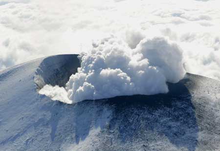 White smoke rises from Mount Asama in Tsumagoi, about 140 km (87 miles) northwest of Tokyo, Feb. 2, 2009. The volcano in central Japan erupted on Monday, spewing hot rocks and ash, but there was no major damage in the sparsely populated vicinity, the Japan Meteorological Agency said. 