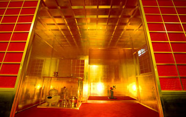 The picture taken on Feb. 2, 2009 shows a golden tea ceremony room and a golden tea set on display at a gold exhibition in Tokyo, Japan.