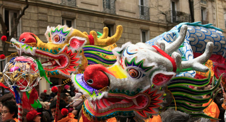 Traditional Chinese dragon dance is seen during a Chinese Lunar New Year celebration at a China Town in Paris, capital of France, on Feb. 1, 2009.(Xinhua/Zhang Yuwei)