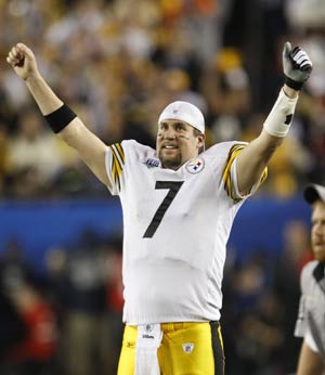 Pittsburgh Steelers quarterback Ben Roethlisberger celebrates after teammate James Harrison ran 100 yards with an interception for a second quarter touchdown against the Arizona Cardinals during the NFL's Super Bowl XLIII football game in Tampa, Florida, February 1, 2009. 